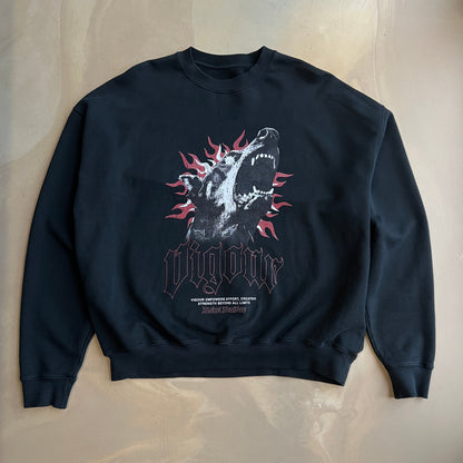 Vintage Black long-sleeve sweater with graphic design on a concrete surface